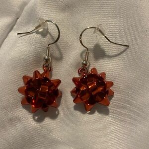 Red Christmas bow earrings. Never worn.